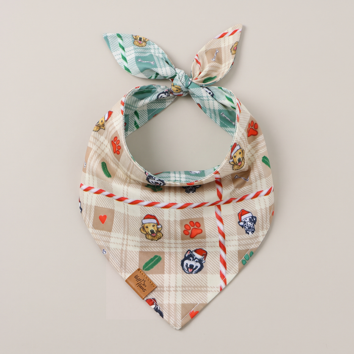 Candy Cane Tails reversible dog bandana, Cream Candy side, tied flat lay